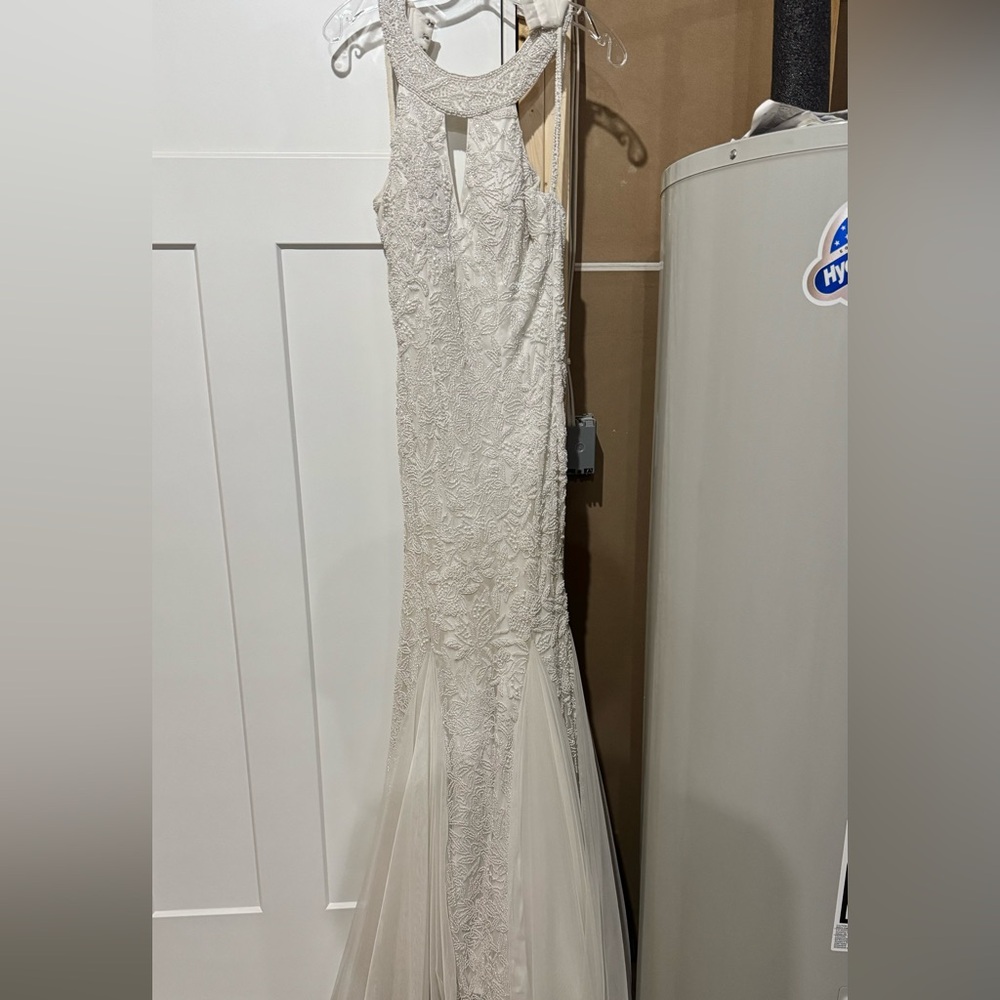 White beaded Sherri hill gown